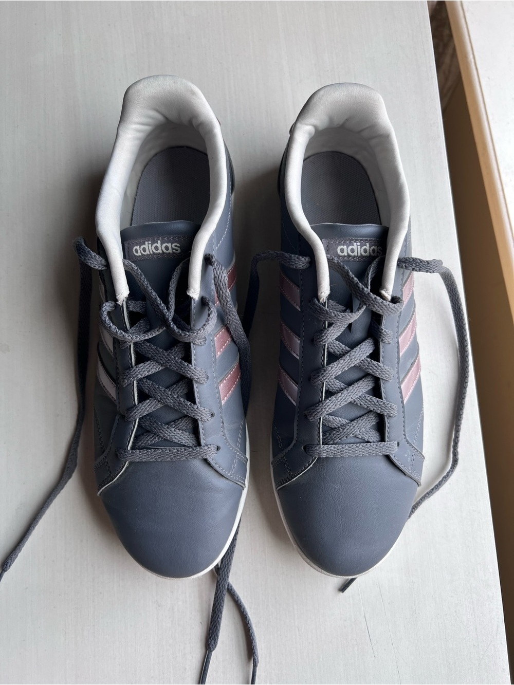 adidas women’s Gray Sneakers with rose gold Stripes